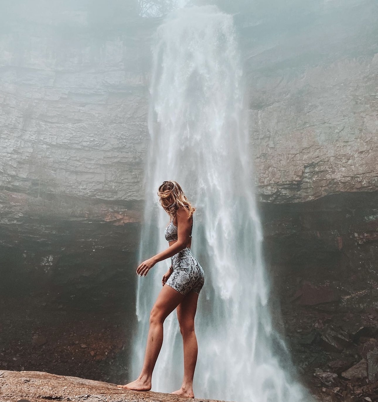 Marla standing in front of fall creek falls 