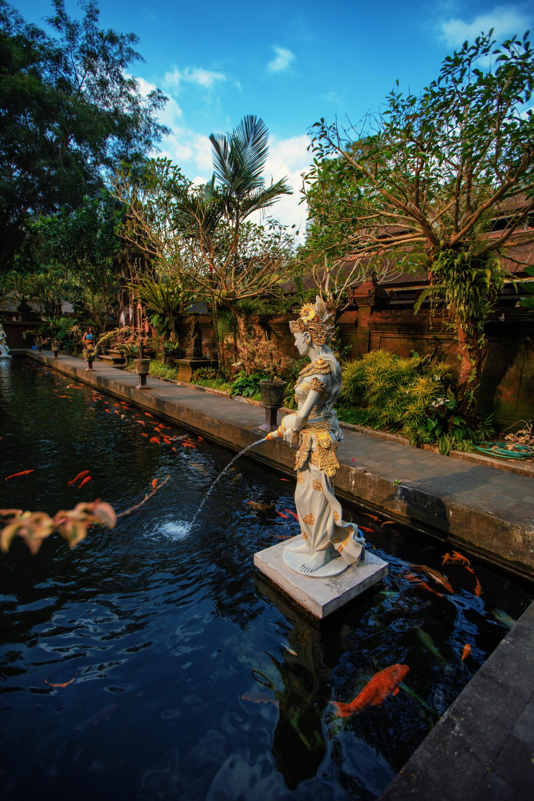 Statue at Tirta Emoul Temple. The statue has water coming out of it