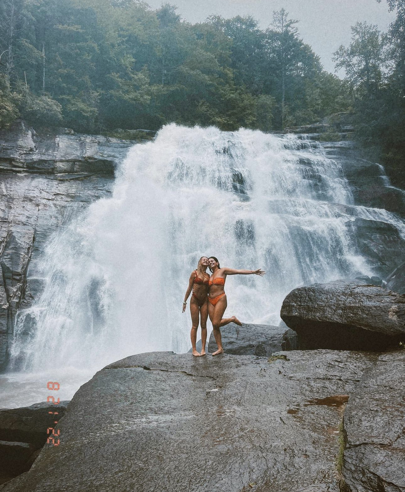 Marla and her friend standing in front of Rainbow Falls, NC